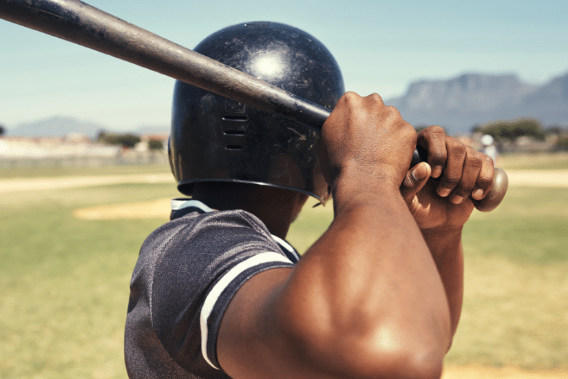 Baseball athlete standing at bat